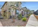 Well-maintained home featuring a charming front yard with gravel landscaping at 10650 Sariah Skye Ave, Las Vegas, NV 89166
