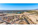 An aerial view of a charming community with views of the adjacent river and surrounding mountains at 3665 Cottage Stone Ct, Laughlin, NV 89029
