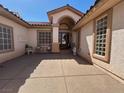 Inviting courtyard featuring ample seating, classic décor, and a well-manicured exterior at 10657 San Vercelli Ct, Las Vegas, NV 89141