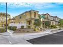 Corner lot featuring lush landscaping, sidewalk access, and a charming, well-maintained facade at 2020 Self Portrait St, Henderson, NV 89044