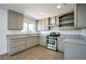 Bright kitchen featuring stainless steel appliances, ample counter space, and modern cabinets, perfect for cooking enthusiasts at 3950 Ventura Way, Las Vegas, NV 89121