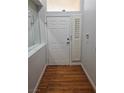 The entryway features hardwood floors, a white door, and natural light at 5155 W Tropicana Ave # 2089, Las Vegas, NV 89103