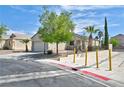 Attractive single-story home with a two-car garage and desert landscaping at 5904 Oakton St, Las Vegas, NV 89130