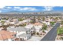 Residential area with mountain views and the city skyline in the distance at 6927 Adobe Villa Ave, Las Vegas, NV 89142