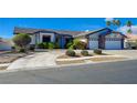 Beautiful single-story home features a spacious driveway and well-maintained landscaping at 7461 Tahoe Basin Dr, Las Vegas, NV 89129