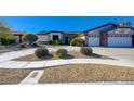 Beautiful single story home with a circular driveway and well-manicured landscaping at 7461 Tahoe Basin Dr, Las Vegas, NV 89129