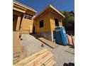 Exterior view of a new construction home featuring a temporary ramp and port-a-potty at 1764 Amarone Way, Henderson, NV 89012
