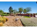 Welcoming Solera community sign surrounded by lush landscaping and desert flora at 2534 Starlight Valley St, Henderson, NV 89044