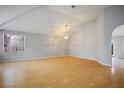 Bright living room featuring vaulted ceilings, hardwood floors and lots of natural light at 2622 Rimpacific Cir, Las Vegas, NV 89146