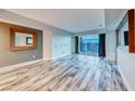 Contemporary living room showcasing a cityscape view, hardwood floors, and modern decor at 2700 Las Vegas Blvd # 3501, Las Vegas, NV 89109