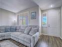 Comfortable living room with large sectional sofa and plenty of natural light at 2743 Peekskill Ave, Henderson, NV 89052