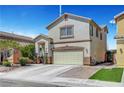 Well-maintained two-story home with attached two-car garage, green grass, and desert landscaping at 3744 Alpine Bypass Ave, North Las Vegas, NV 89081