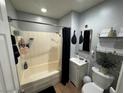 Cozy bathroom with a shower-tub combo, vanity, and neutral tones, creating a relaxing space at 4825 E Monroe Ave, Las Vegas, NV 89110