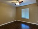 Cozy bedroom features a window with blinds and neutral walls ready for your personal touch at 6650 W Warm Springs Rd # 2173, Las Vegas, NV 89118