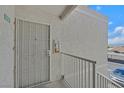 Apartment entry showing security door with a neighborhood view at 6800 E Lake Mead Blvd # 2050, Las Vegas, NV 89156