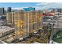 Striking exterior view showcasing the building's architectural design and its central location at 135 E Harmon Ave # 3320, Las Vegas, NV 89109