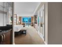 Beautiful bedroom boasts an abundance of sunlight with sitting area and kitchenette at 125 E Harmon Ave # 2215, Las Vegas, NV 89109