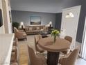 Open concept living and dining areas with neutral paint and modern furnishings at 1450 Hialeah Dr # D, Las Vegas, NV 89119