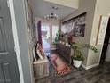 Welcoming foyer with stylish accents, natural light, and modern flooring creating a warm and inviting entrance at 415 Golden State St, Henderson, NV 89012