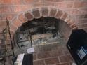 Brick fireplace with arched opening at 4233 Kensington Way, Las Vegas, NV 89108