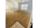 Bright living room with neutral carpet, ample natural light, and an open layout for comfortable living at 45 Maleena Mesa St # 1321, Henderson, NV 89074