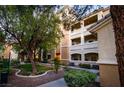 Exterior of building showing landscaping and architecture at 8777 W Maule Ave # 1087, Las Vegas, NV 89148
