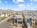 New construction homes in the Mountain View neighborhood with desert landscaping at 10830 Space Odyssey Ave, Las Vegas, NV 89129