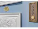 Close up of door showing the apartment number and doorbell at 205 E Harmon Ave # 306, Las Vegas, NV 89169