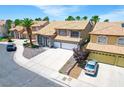 Lovely home with two-car garage, mature landscaping, and desert-style front yard at 5 Red Fawn Ct, Henderson, NV 89074