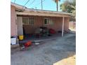 Covered patio in a yard with minimal landscaping at 5324 Del Monte Ave, Las Vegas, NV 89146