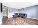 Bright and airy living room with sleek flooring and comfortable seating arrangement at 6232 Bristol Way, Las Vegas, NV 89107