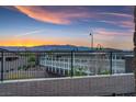 Beautiful sunset and mountain views from the outdoor balcony at 746 Purple Knoll Walk, Henderson, NV 89011