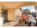 Inviting condo entryway with a welcoming wreath on the front door, showing a well kept living space at 8455 W Sahara Ave # 287, Las Vegas, NV 89117