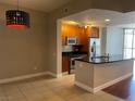 Stylish kitchen featuring stainless steel appliances, granite countertops, and an island with a sink at 200 W Sahara Ave # 2211, Las Vegas, NV 89102