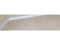 Close-up of neutral carpeting, with white baseboards at 143 Constitution Ave, Henderson, NV 89015