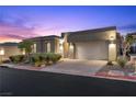 Charming single-Gathering home featuring a modern exterior design, well-manicured landscaping, and a two-car garage at 18 Via Tiberina, Henderson, NV 89011