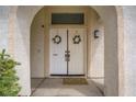 Close-up of the double front doors with decorative wreaths, creating a welcoming entrance at 1830 Ginger Blossom Ave, North Las Vegas, NV 89031