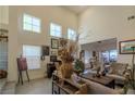 A sunny living room showcasing art and comfortable seating at 2649 Golden Sands Dr, Las Vegas, NV 89128