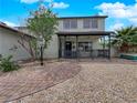 Inviting home with covered front porch and manicured gravel landscaping at 2761 Phoenix St, Las Vegas, NV 89121
