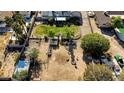 Aerial view showcasing the property's large lot, mature trees, and potential for outdoor activities at 3100 Garehime St, Las Vegas, NV 89108