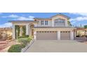 Charming two-story home featuring a three car garage, well-manicured landscaping, and a welcoming entrance, great curb appeal at 3755 Broadmead St, Las Vegas, NV 89147