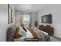 Serene bedroom with plush bedding, modern furnishings, and calming decor at 5135 Paradise Valley Ave, Las Vegas, NV 89156