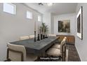 Contemporary dining room with sleek table, stylish seating, and ample natural light at 5135 Paradise Valley Ave, Las Vegas, NV 89156