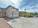 Home with large driveway and basketball hoop; perfect for an active lifestyle at 9509 Arrowhead Falls Ct, Las Vegas, NV 89148