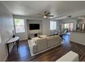 Bright living room with an open floor plan and updated furnishings, perfect for entertaining at 1725 Queen Victoria St # 103, Las Vegas, NV 89144