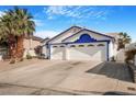 Charming single-Gathering home with a large three car garage and well kept lawn at 182 Horizon View Dr, Henderson, NV 89015