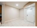Bright entryway featuring tile floors, neutral walls, and a solid front door at 200 W Sahara Ave # 1810, Las Vegas, NV 89102