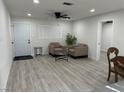 Inviting living room showcasing contemporary decor, recessed lighting, and stylish flooring at 2820 Richfield Blvd, Las Vegas, NV 89102