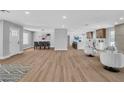 Expansive living space with an open floor plan, modern finishes, and seamless flow to the kitchen at 3334 W Mardon Ave, Las Vegas, NV 89139