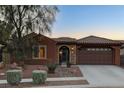 Charming single-story home with well-maintained landscaping, a two-car garage, and a welcoming front entrance at 8113 Bay Colony St, Las Vegas, NV 89131